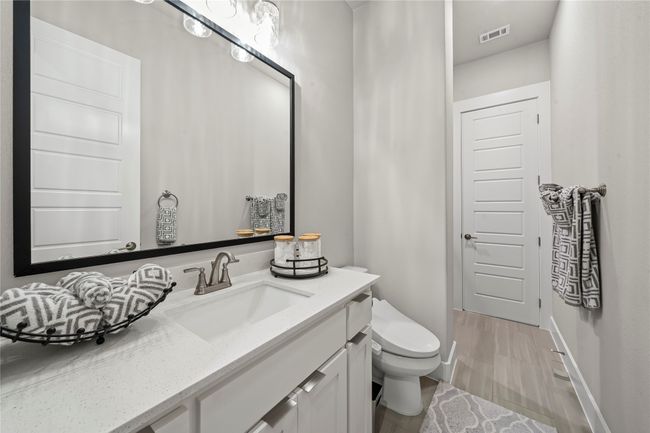Bathroom with vanity with Quartz counters. 3 full baths. | Image 22
