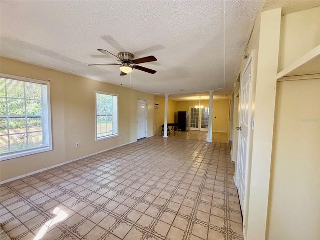 Family Room Facing Dining Room | Image 6