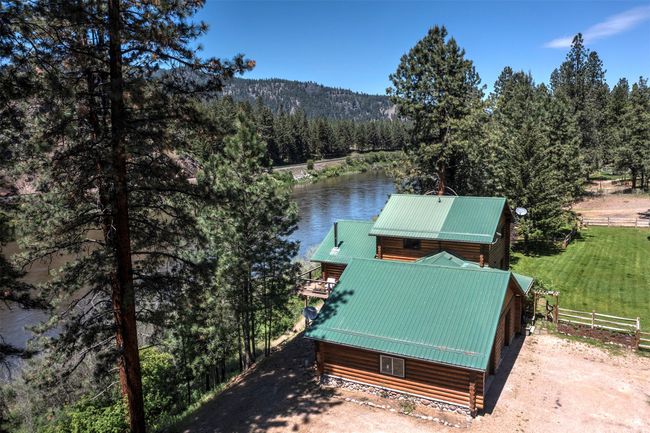 Dock area featuring a water view, a wooded view, and a balcony | Image 69