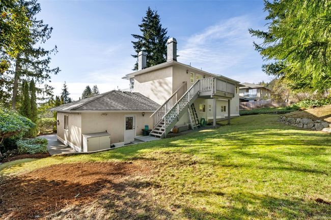 Thoughtfully landscaped; private backyard provides plenty of space for family use | Image 33