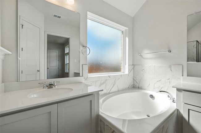 Full bath with vanity and a bath | Image 24