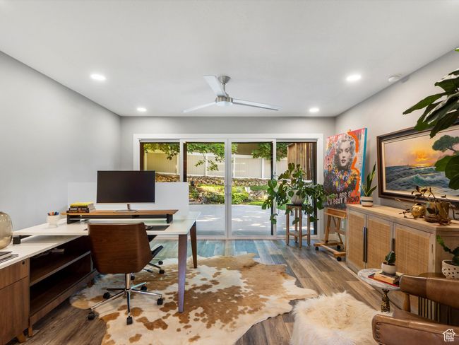 Home office with wood finished floors, recessed lighting, and ceiling fan | Image 6