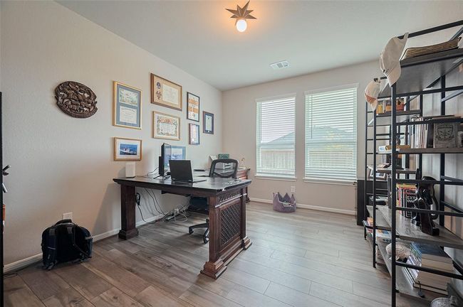 Large office with natural light with French doors. | Image 19
