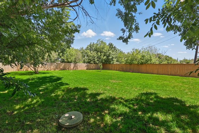 View of yard with a fenced backyard | Image 32