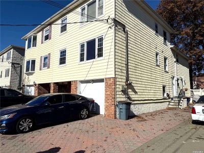 208-17 15th Road, Home with 7 bedrooms, 4 bathrooms and null parking in Bayside NY | Image 1