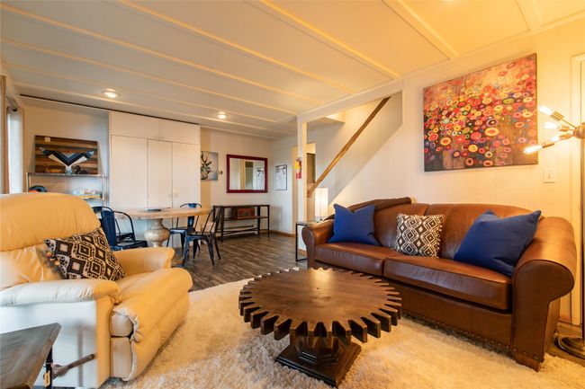 Living room with recessed lighting, stairway, and wood finished floors | Image 9