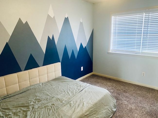 Carpeted bedroom featuring baseboards | Image 10