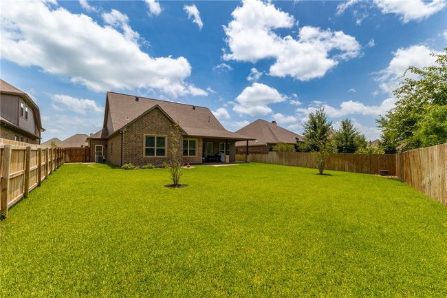 This pool-sized backyard offers endless possibilities for relaxation, recreation, and outdoor fun! | Image 31