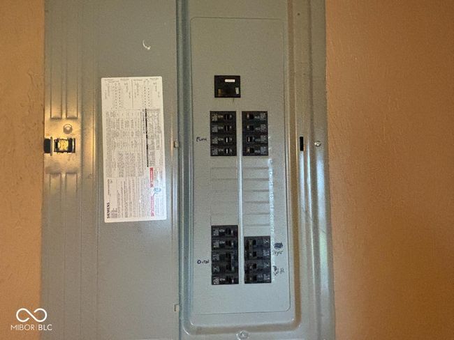 utility room with electric panel | Image 19