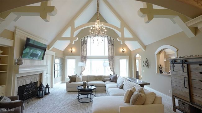 Spectacular Great Room with arched beams ceiling, and gas fireplace with built ins | Image 50