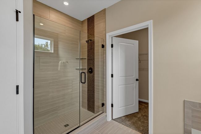 OWNER'S ENSUITE BATH WITH WALK-IN SHOWER | Image 13