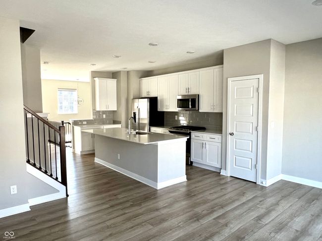 Hearth room into kitchen | Image 29