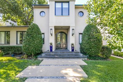 View of exterior entry featuring a lawn | Image 3