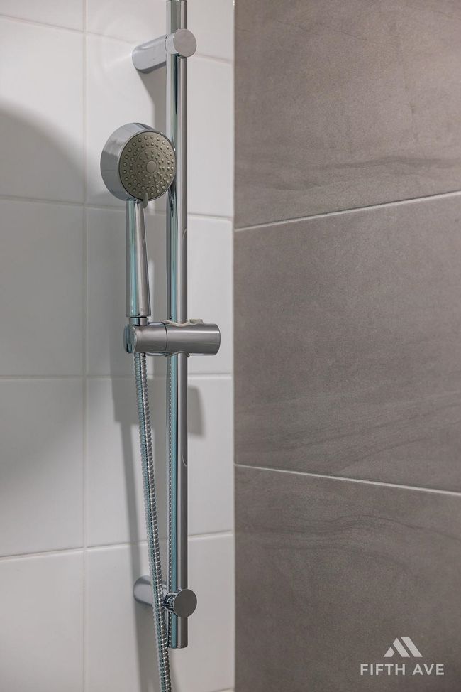 Bathroom view of a shower | Image 33