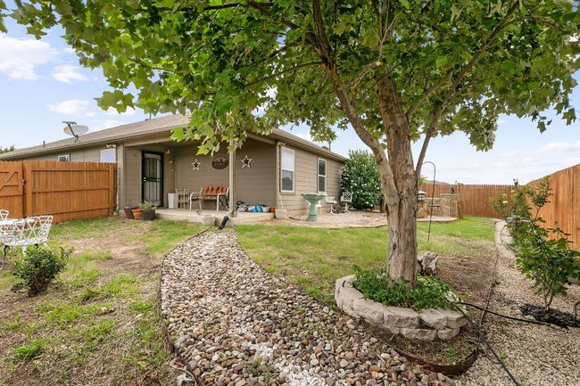 Back of property featuring a patio and a fenced backyard | Image 16