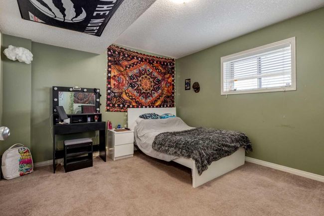 569 Boulder Creek Circle Se, House other with 4 bedrooms, 3 bathrooms and 6 parking in Langdon AB | Image 41