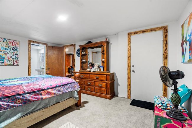 Bedroom with light colored carpet | Image 14