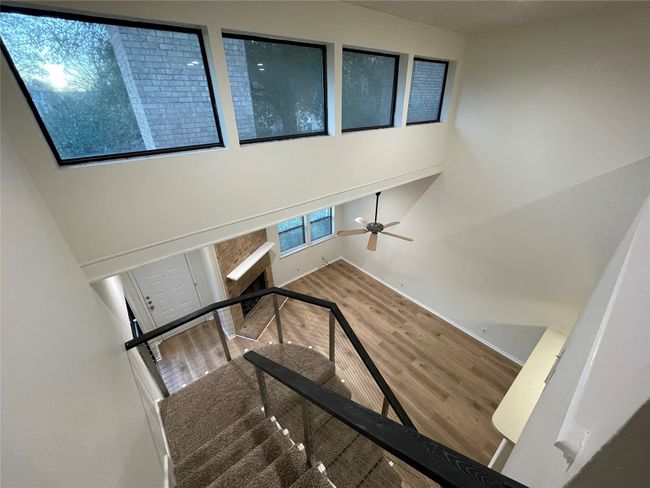 Stairway featuring wood-type flooring | Image 11