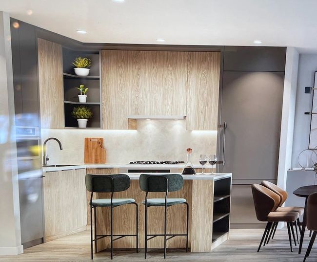 Kitchen featuring modern cabinets, open shelves, light wood finished floors, light countertops, and recessed lighting | Image 4