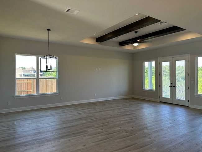 Attached to the family room is the dining area and beautiful kitchen, additional areas where memories can be made while baking your favorite treats or eating dinner as a family | Image 5