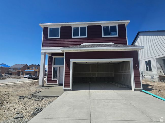 View of front of property featuring driveway and a garage | Image 4