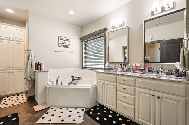 Full bath featuring double vanity, a garden tub, and recessed lighting | Image 16