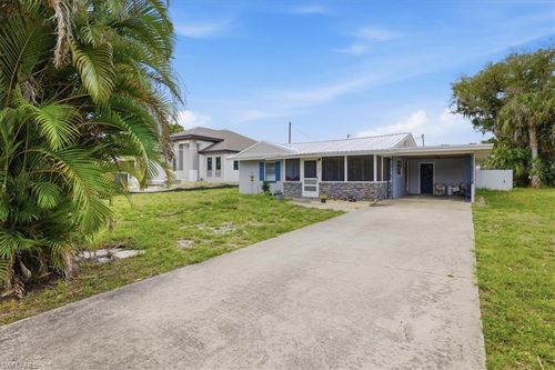 102 Crescent Lake Dr, North Fort Myers, FL, 33917-4145 | Card Image