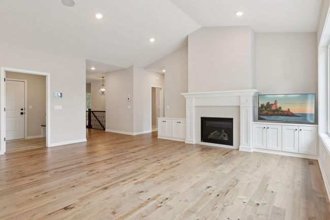 Vaulted main level is inviting offering a warm blend of character and charm | Image 7