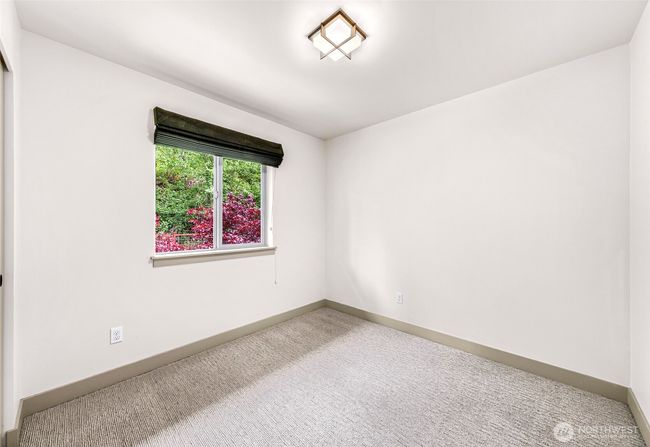 Bedroom 3 looking into the backyard. | Image 26