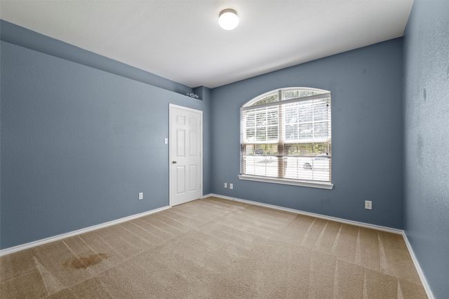 Carpeted empty room with baseboards | Image 30