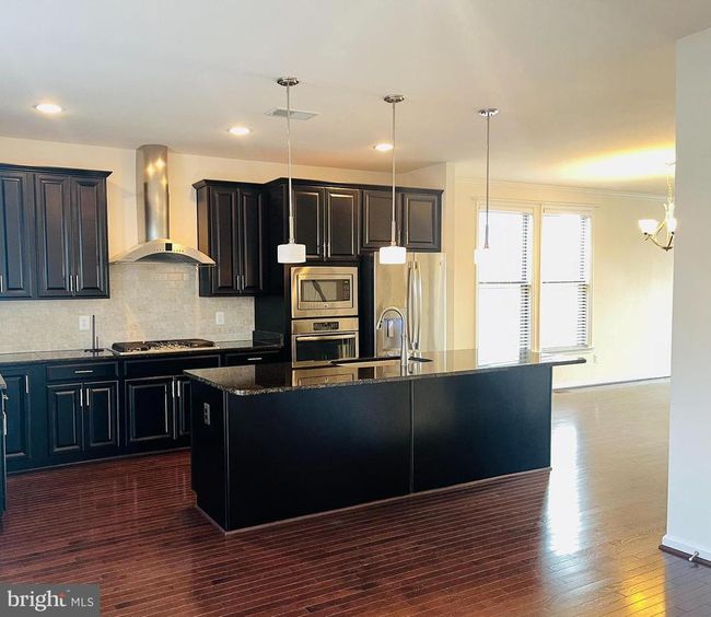 24456 Hawthorn Thicket Ter, Townhouse with 3 bedrooms, 4 bathrooms and null parking in STERLING VA | Image 4