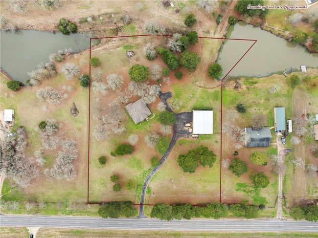 Aerial view featuring a water view | Image 48