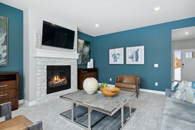 (*Photo of decorated model, actual homes finishes will vary) See how functional the great room space can be, a great place to entertain a large crowd for a Sunday Game or enjoy a quiet movie night with a loved one. | Image 2