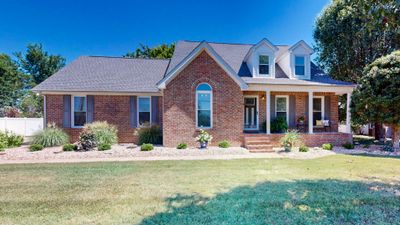 This gorgeous 3BR, 2 1/2 BA home is situated on a beautiful treed lot at the rear of a circular non-thru street in one of Shelbyville's most desirable subdivisions. | Image 1