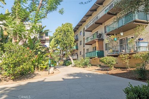 e129-5460 White Oak Avenue, Encino, CA, 91316 | Card Image