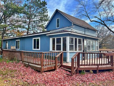 Main view of home with large deck.jpg | Image 1