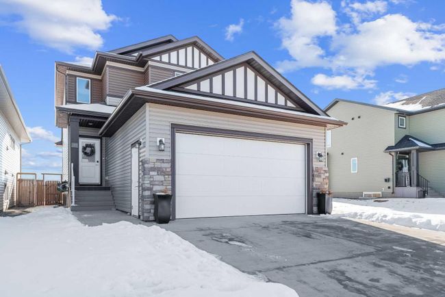 165 Norseman Close, Home with 4 bedrooms, 3 bathrooms and 2 parking in Penhold AB | Image 2