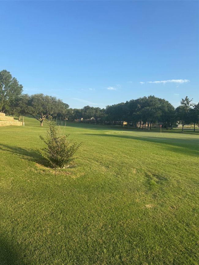 View of home's community with a yard | Image 5