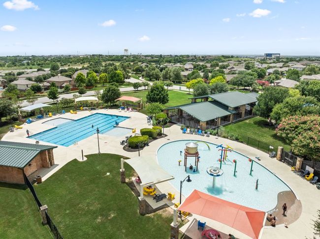 Make a splash all summer long in the Olympic-sized community pool, perfect for swimming laps or lounging poolside. | Image 28