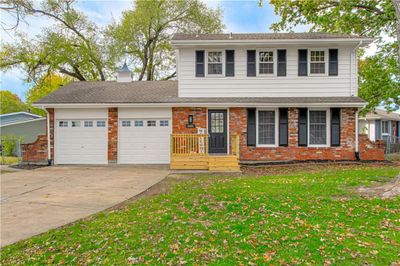 New Garage Doors and Fresh Exterior Paint/Aluminum Siding | Image 1