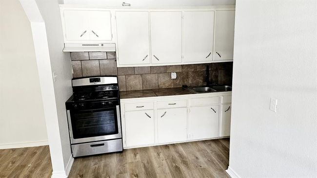 Kitchen in one bedroom in Unit A. | Image 34