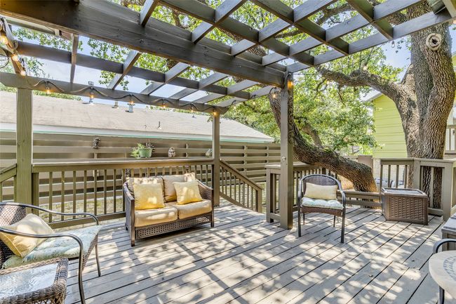 Wooden deck with outdoor lounge area and a pergola | Image 34