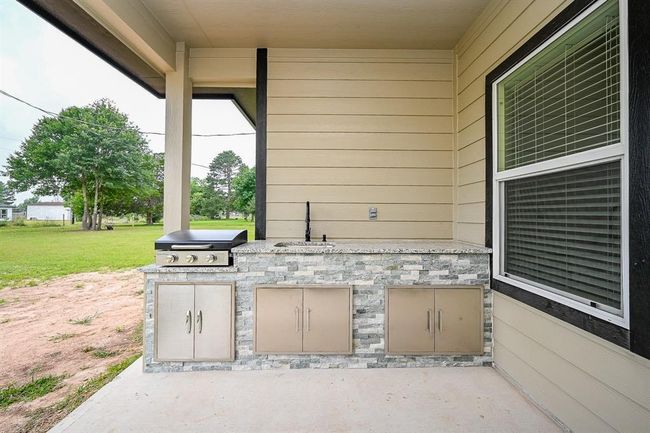 The Covered Patio Is Wonderful For Hosting Outdoor BBQs | Image 29