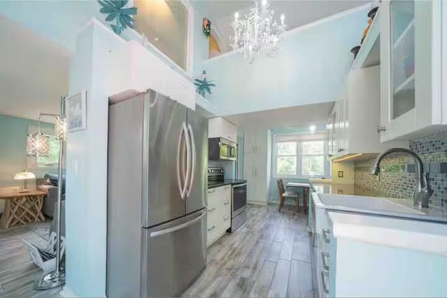 UNIT-22 - 7372 N Shore Dr, Condo with 3 bedrooms, 3 bathrooms and null parking in South Haven MI | Image 9