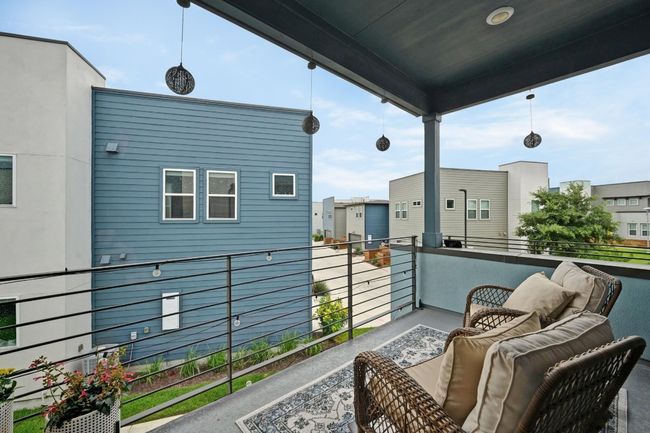 Step out onto your private balcony and enjoy peaceful views of the community, an ideal spot for morning coffee or evening relaxation | Image 17