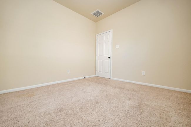Take advantage of sharp corners for treasured accents and the creation of reading or hobby nooks in a spacious secondary bedroom. | Image 21