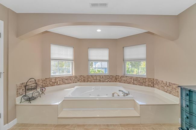 Bathroom with plenty of natural light and a jetted tub | Image 26