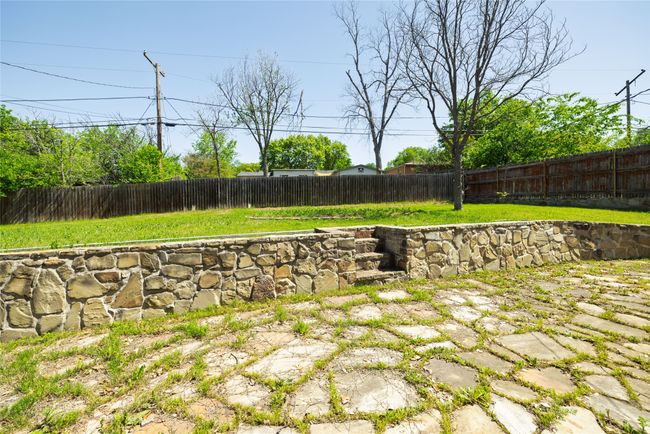 View of yard featuring a fenced backyard | Image 35