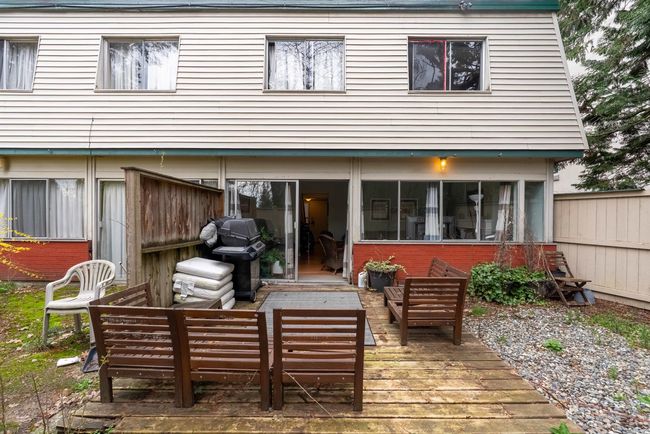 Back of property with outdoor lounge area and fence | Image 20