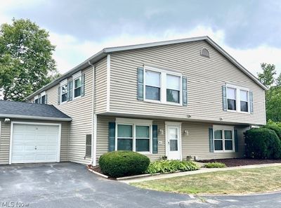 View of front of house featuring a garage | Image 2